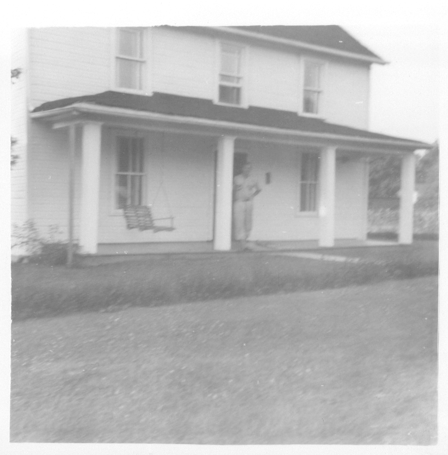 Charles Leo Chuck McGarvey on the porch of the 503 West C Street house in the late 1940s