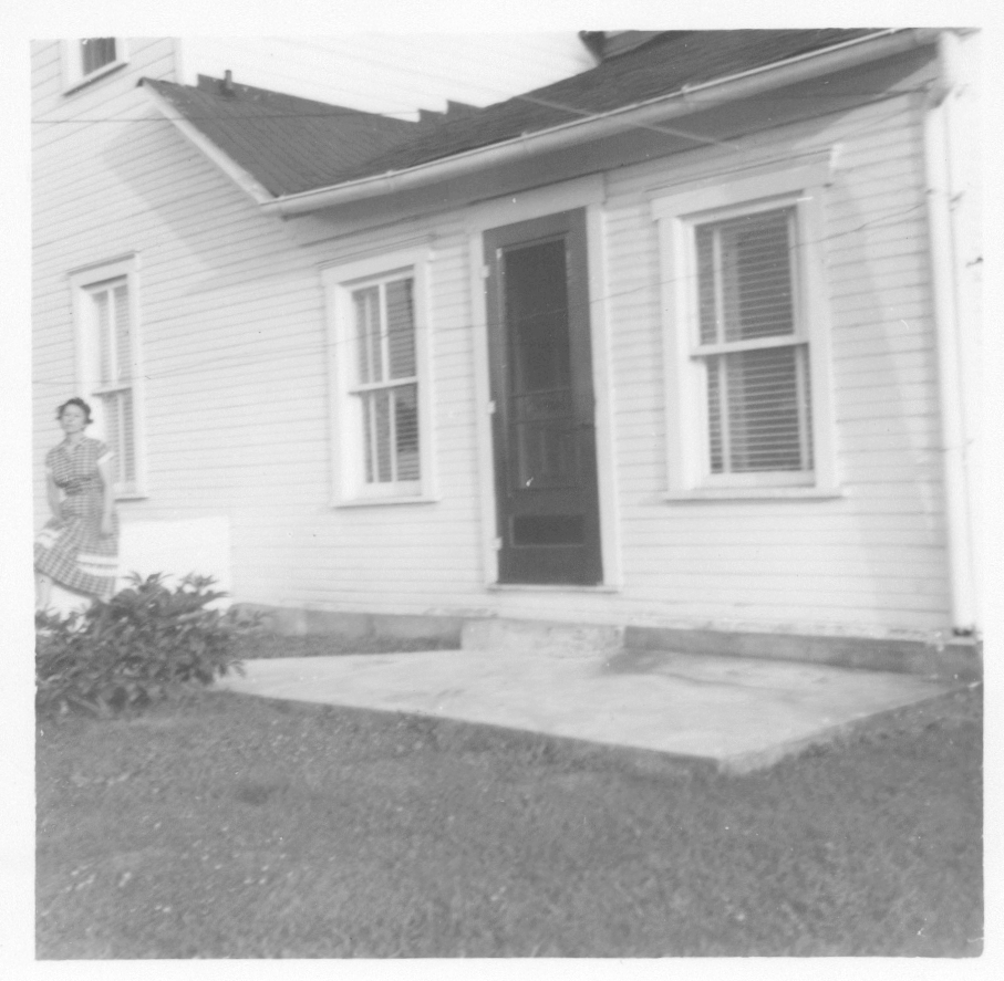 Mary Ann McGarvey beside the 503 West C Street house in the late 1940s