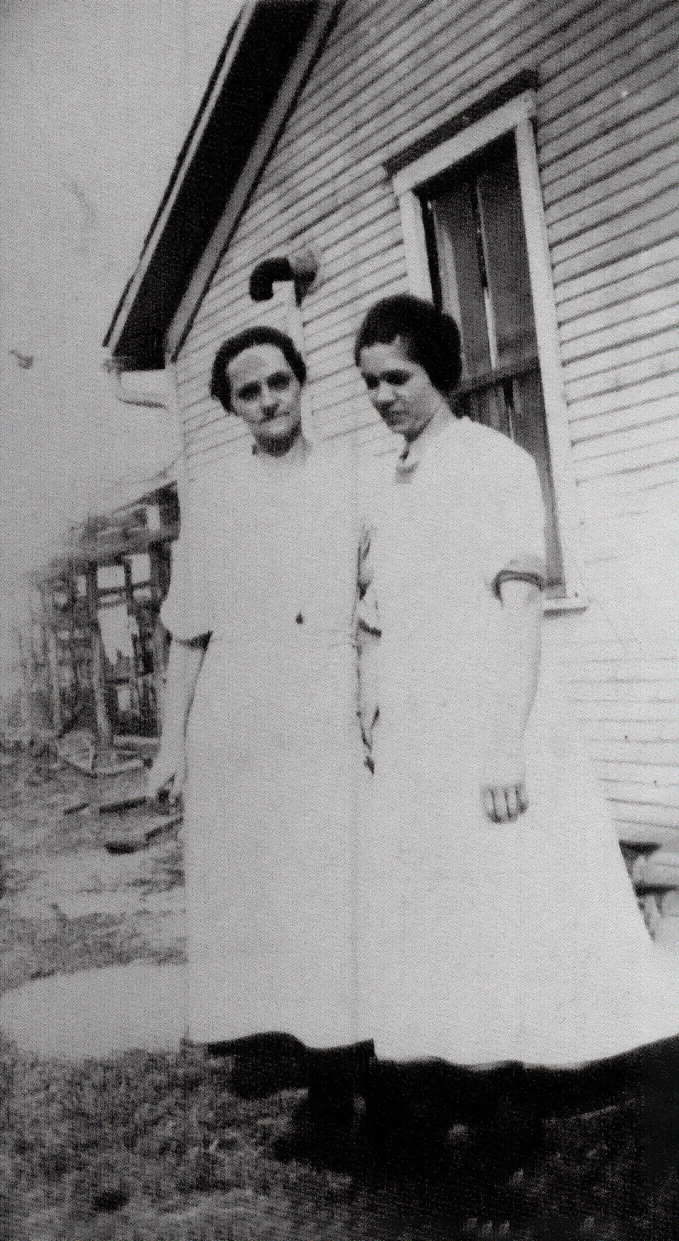Mary Patton McGarvey standing with a young woman, likely her daughter Susan Anna McGarvey