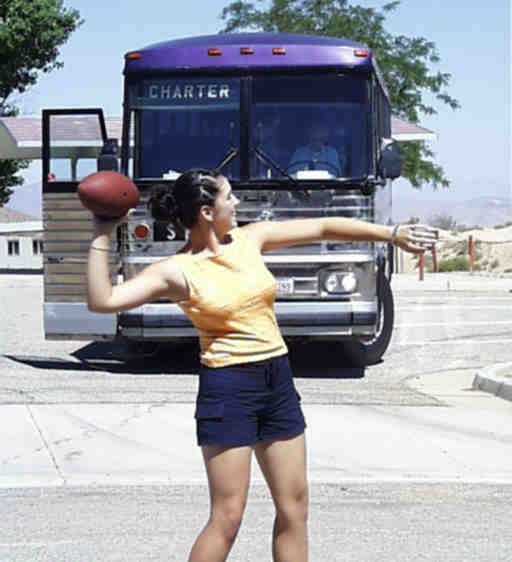 Student playing football during the trip